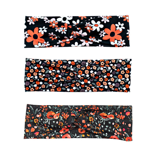 Set of three floral-patterned headbands on a white background